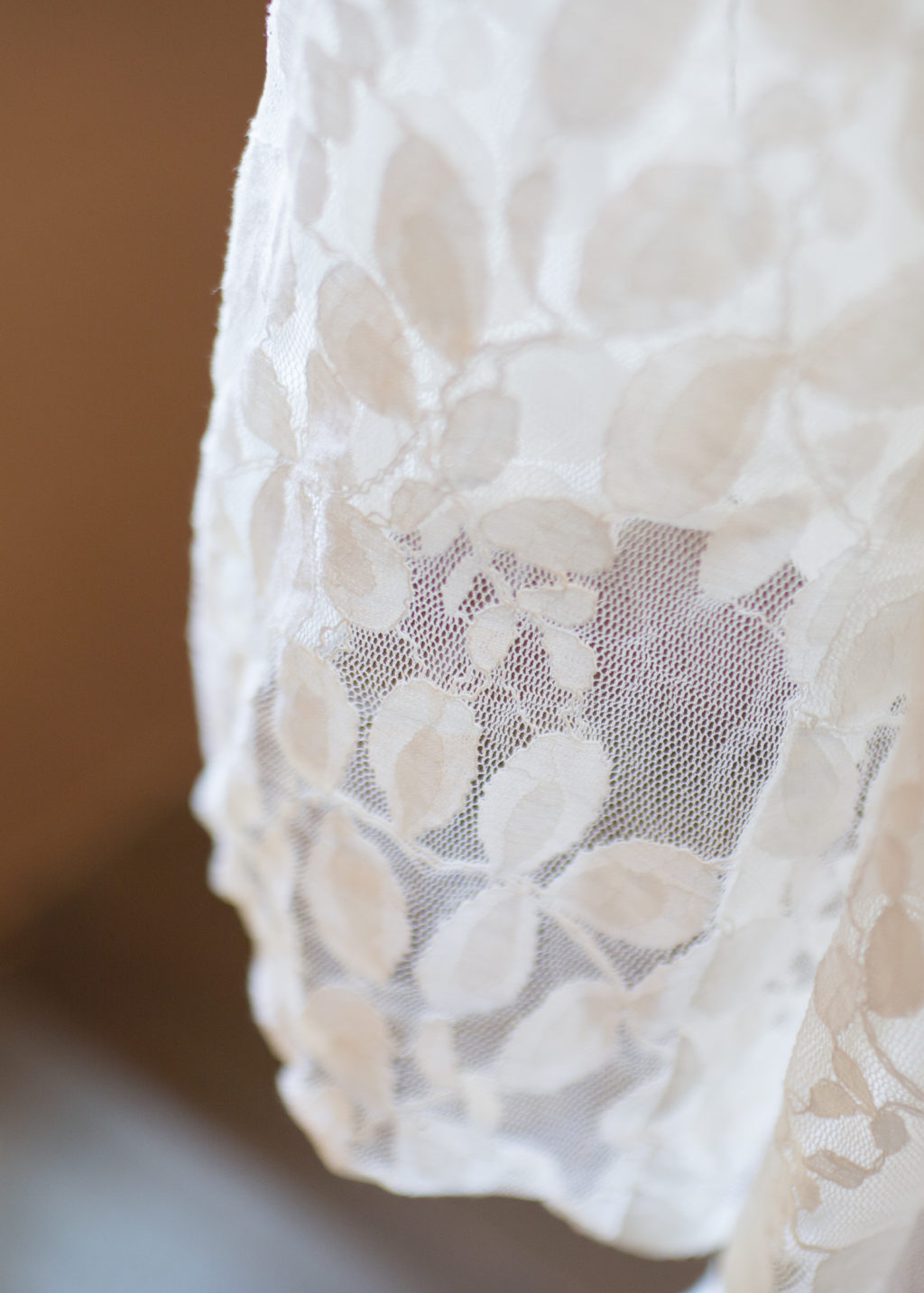 Detail of lace wedding dress