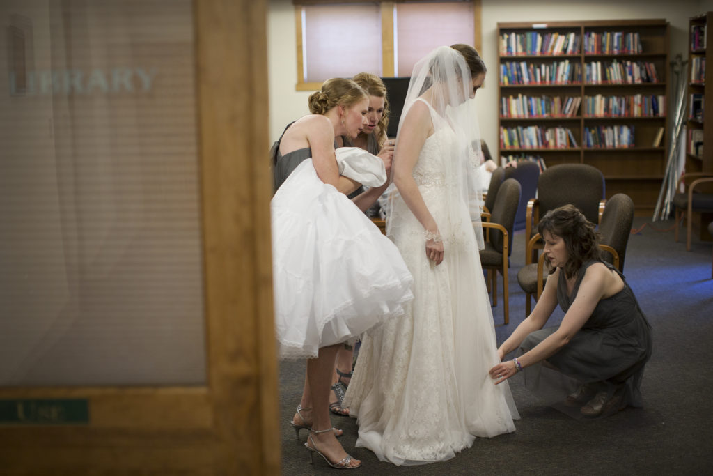 bride getting ready with bridesmaids