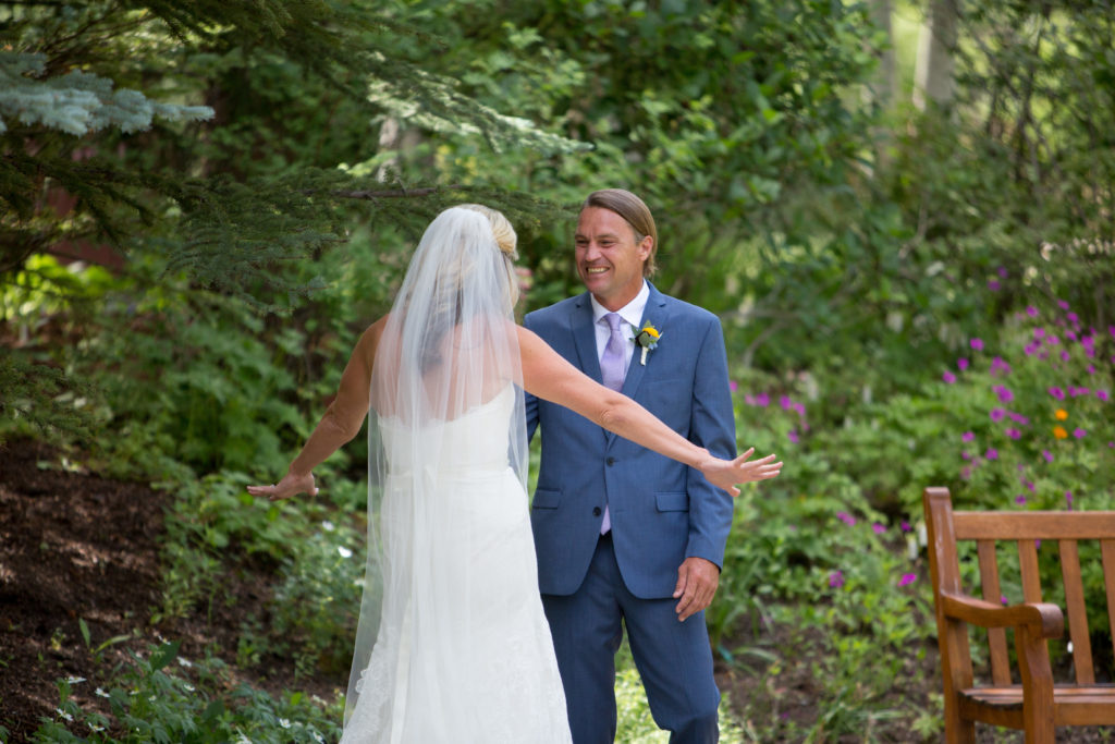 Betty Ford Alpine Gardens bride and groom first look before vail golf course wedding at gore range