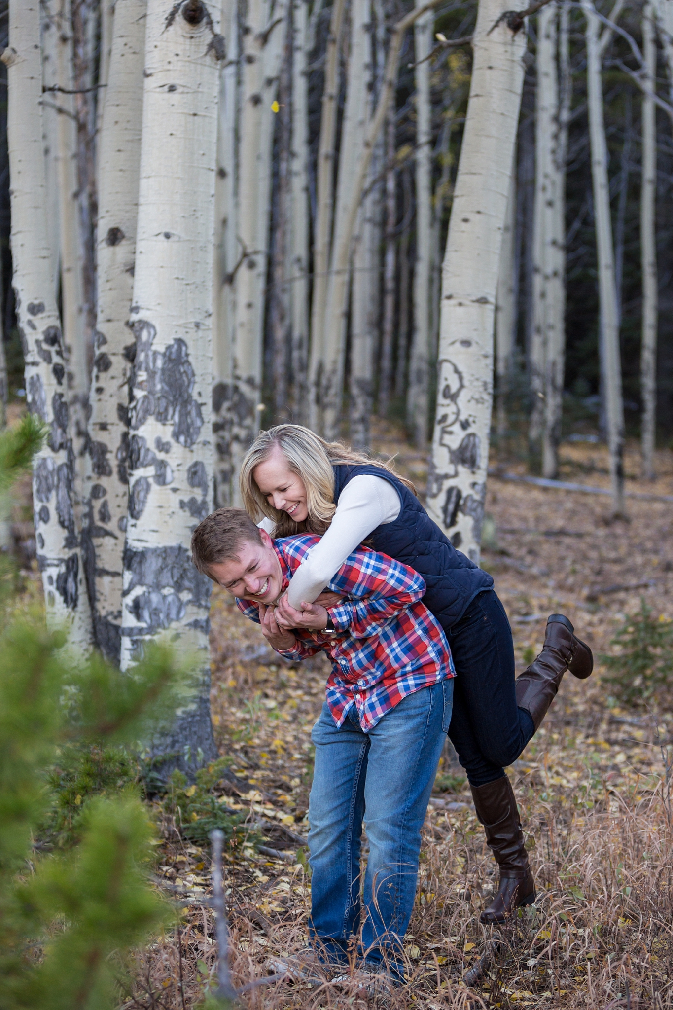 what to wear for an engagement session in the fall plaid and vests