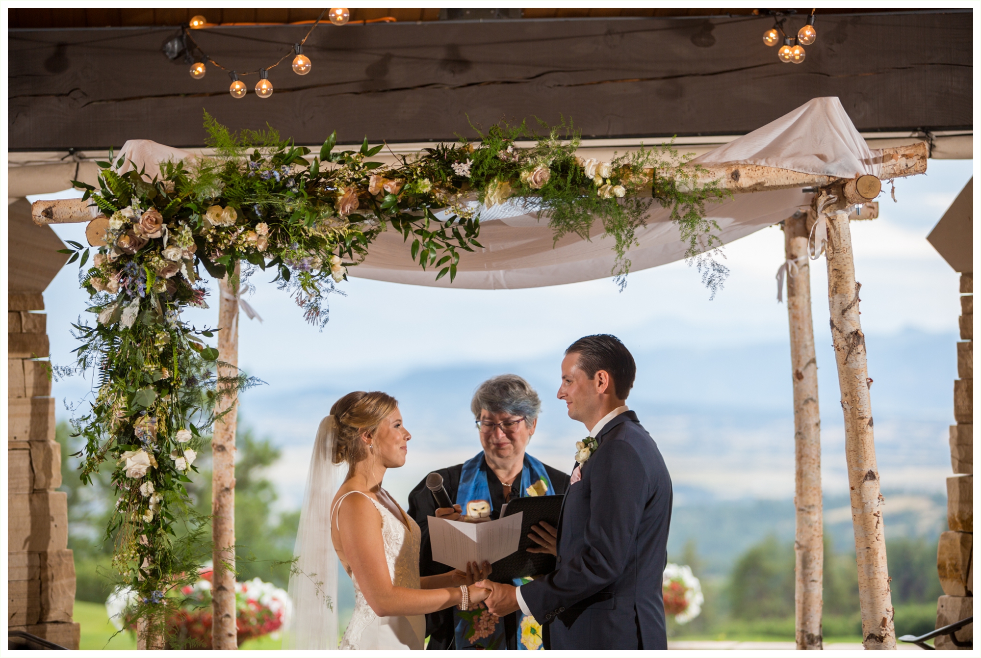 bride and groom during jewish wedding ceremony at sanctuary golf course