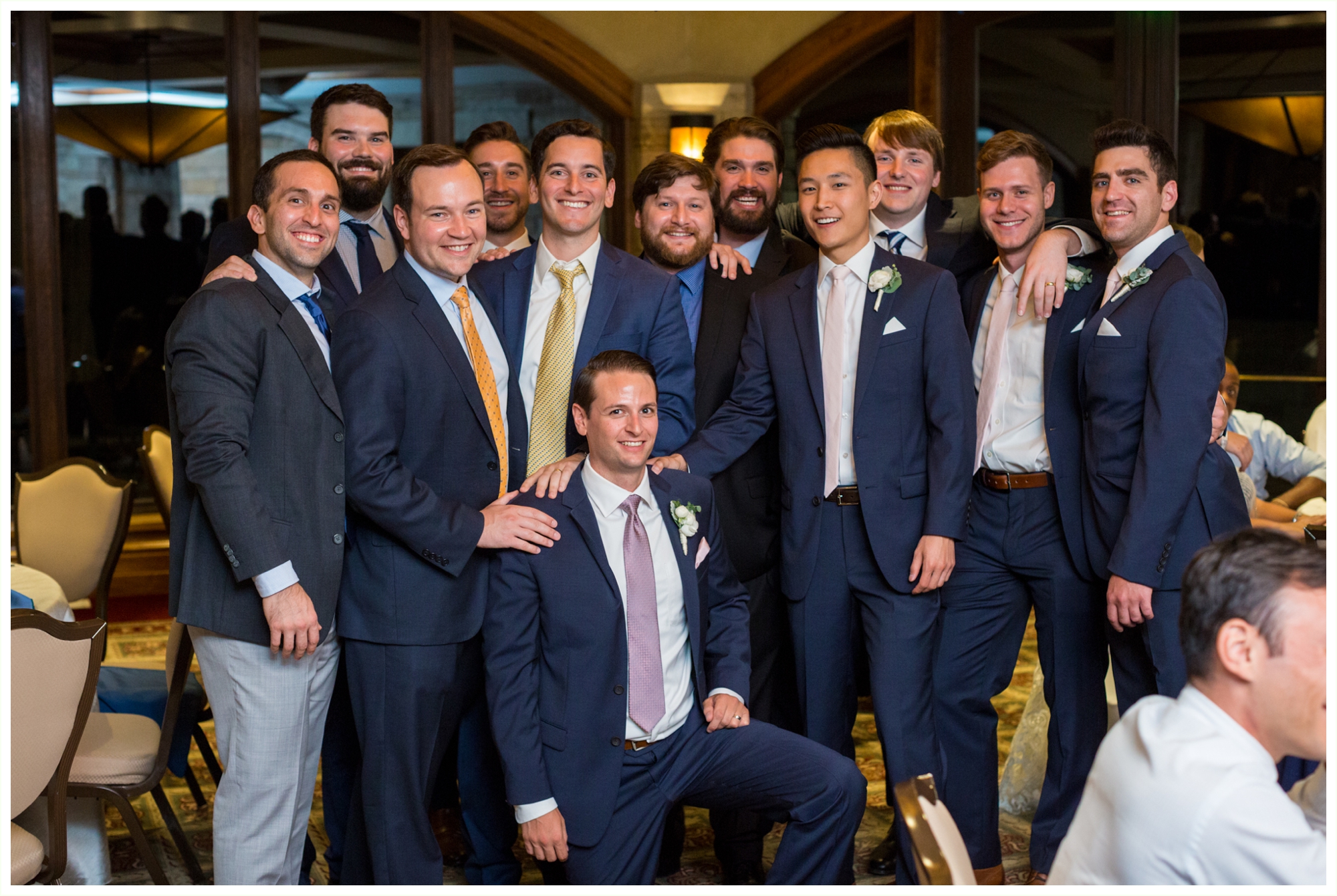 groom and his best friends photo at wedding reception 