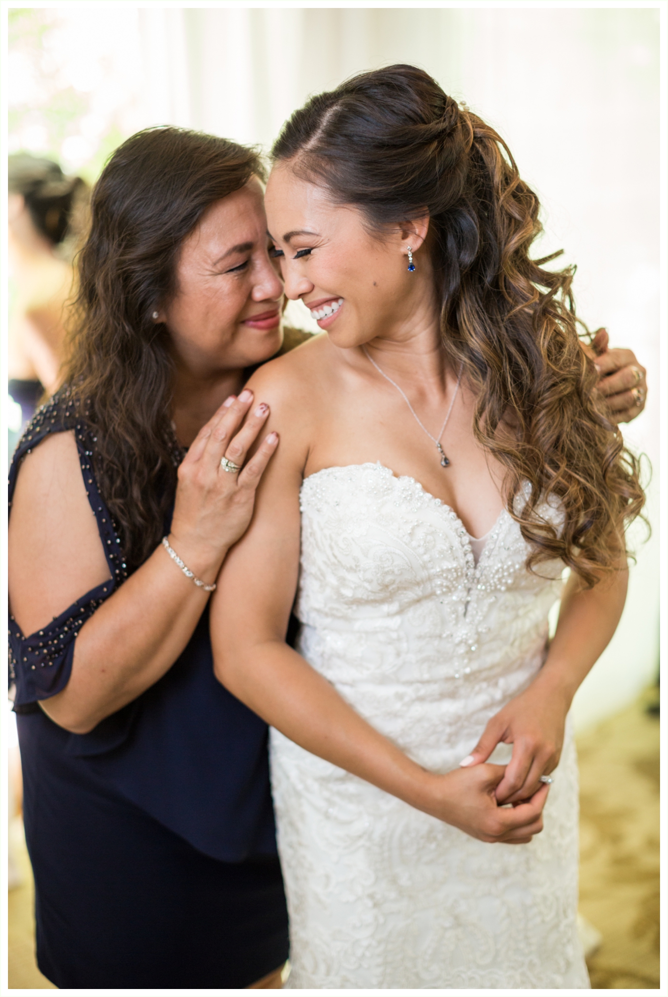 bride shares special moment with her mother during getting ready for wedding