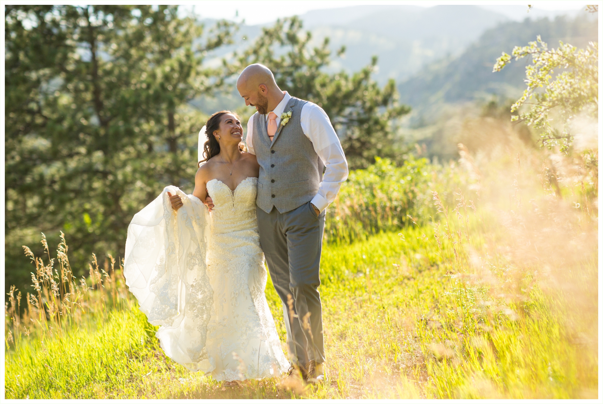 bride and groom epic mountain portraits walking together. stone mountain lodge wedding photos. 