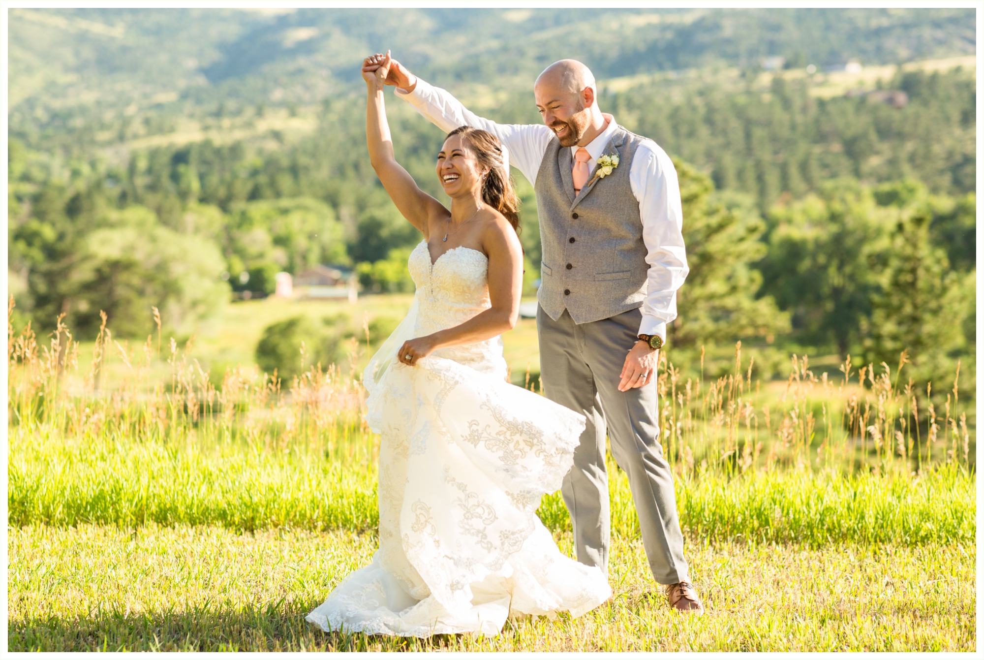 bride and groom epic mountain portraits dancing together. stone mountain lodge wedding photos. 