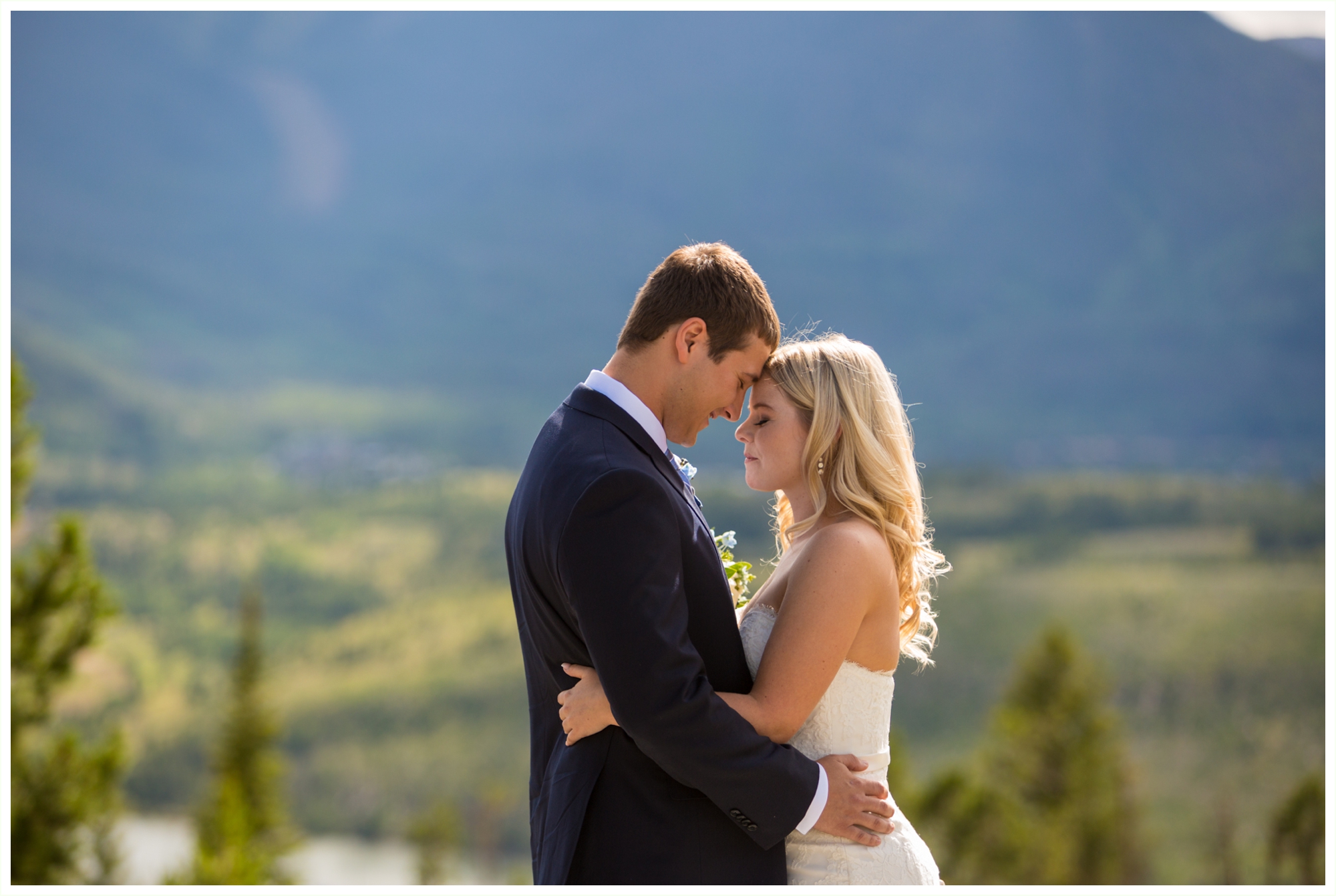 bride and groom outdoor wedding portraits at sapphire point overlook lake dillon