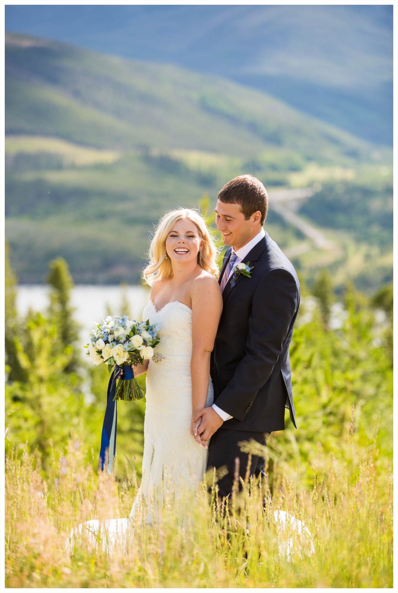 bride and groom candid natural wedding portraits at sapphire point overlook lake dillon