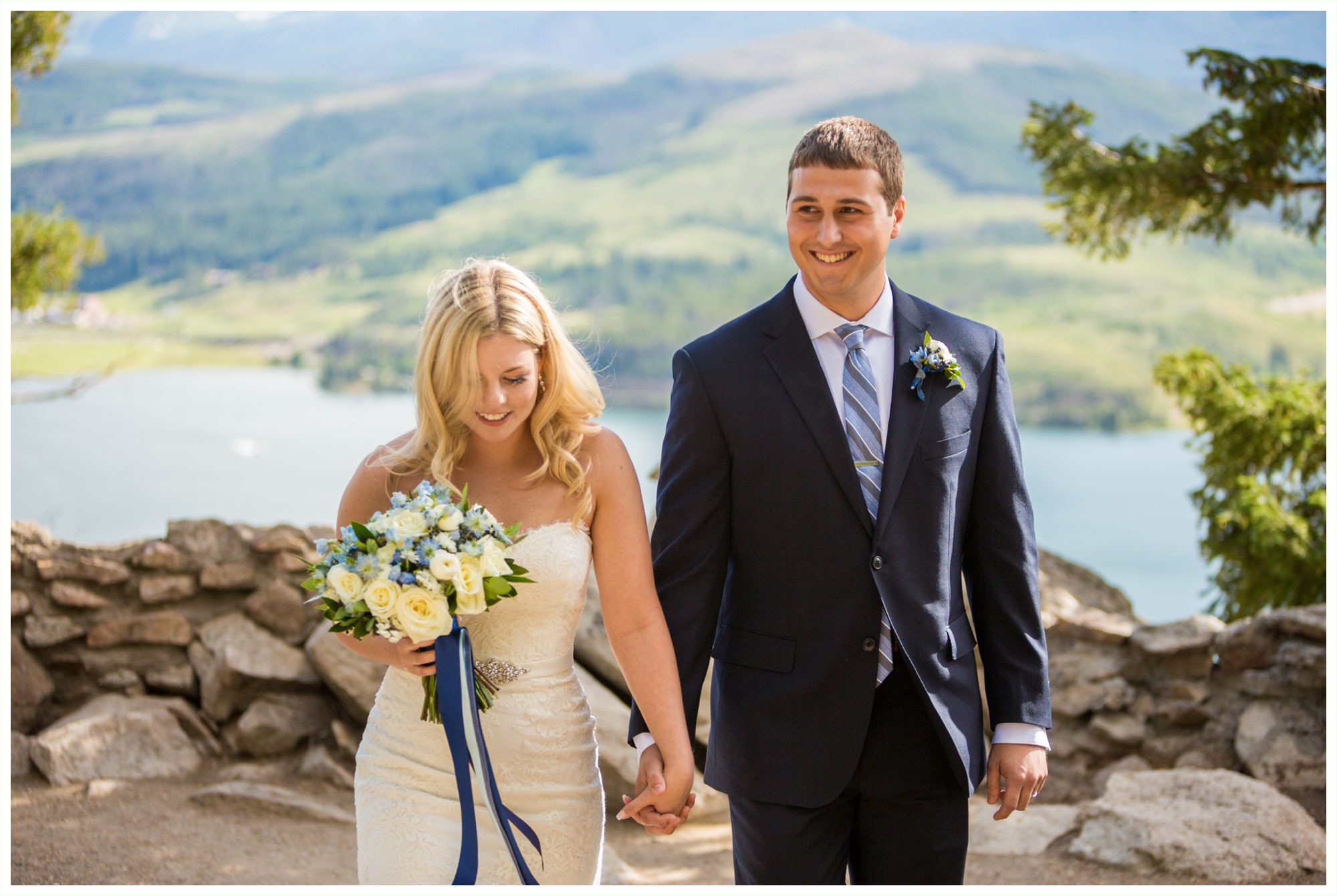 bride and groom walk down aisle after getting married at sapphire point overlook wedding ceremony at lake dillon colorado