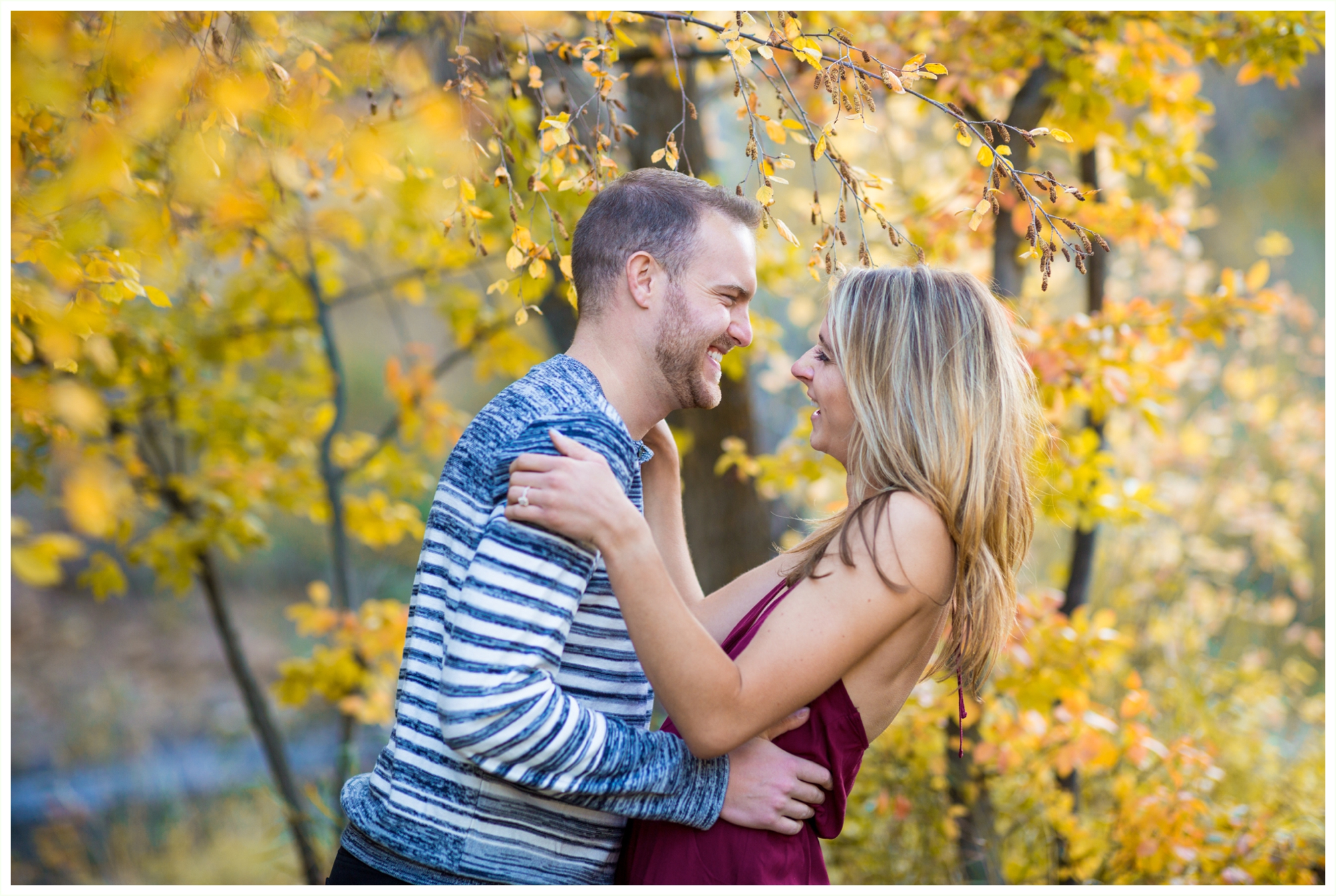 candid engagement photos at lair o the bear park colorado fall engagement session