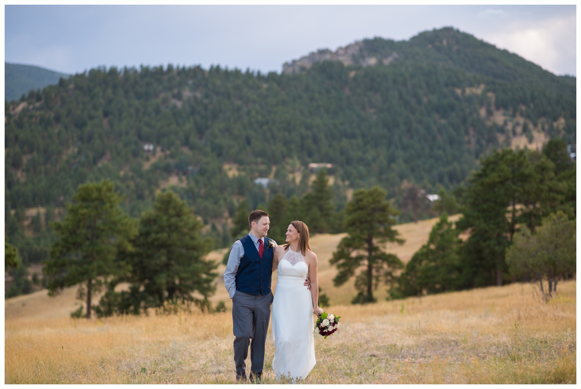 beautiful just married portraits at betasso preserve boulder canyon intimate elopement couple walking and looking at each other