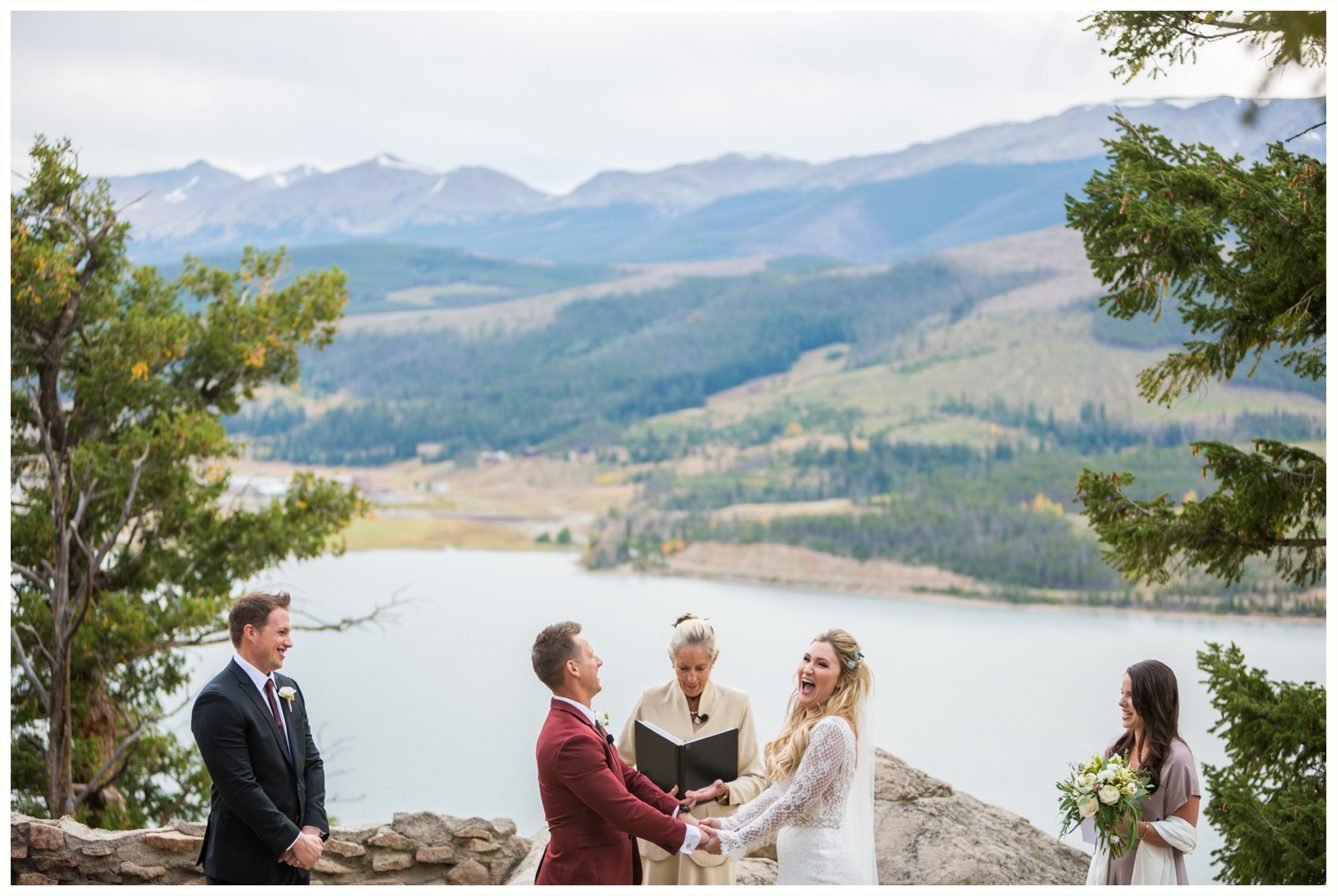 wedding ceremony at sapphire point elopement breckenridge wedding photographer kathryn kim bride and groom laugh candidly
