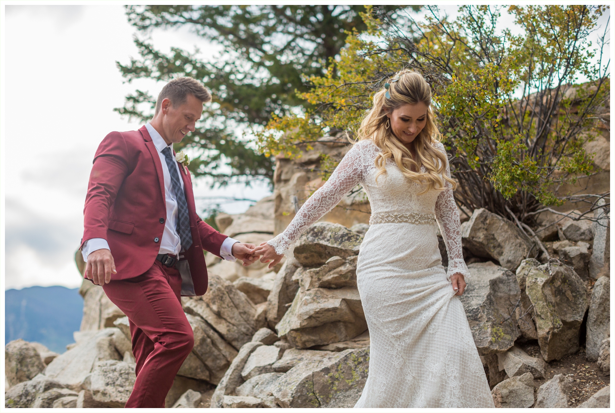 sapphire point overlook wedding portraits on the rocks groom maroon suit