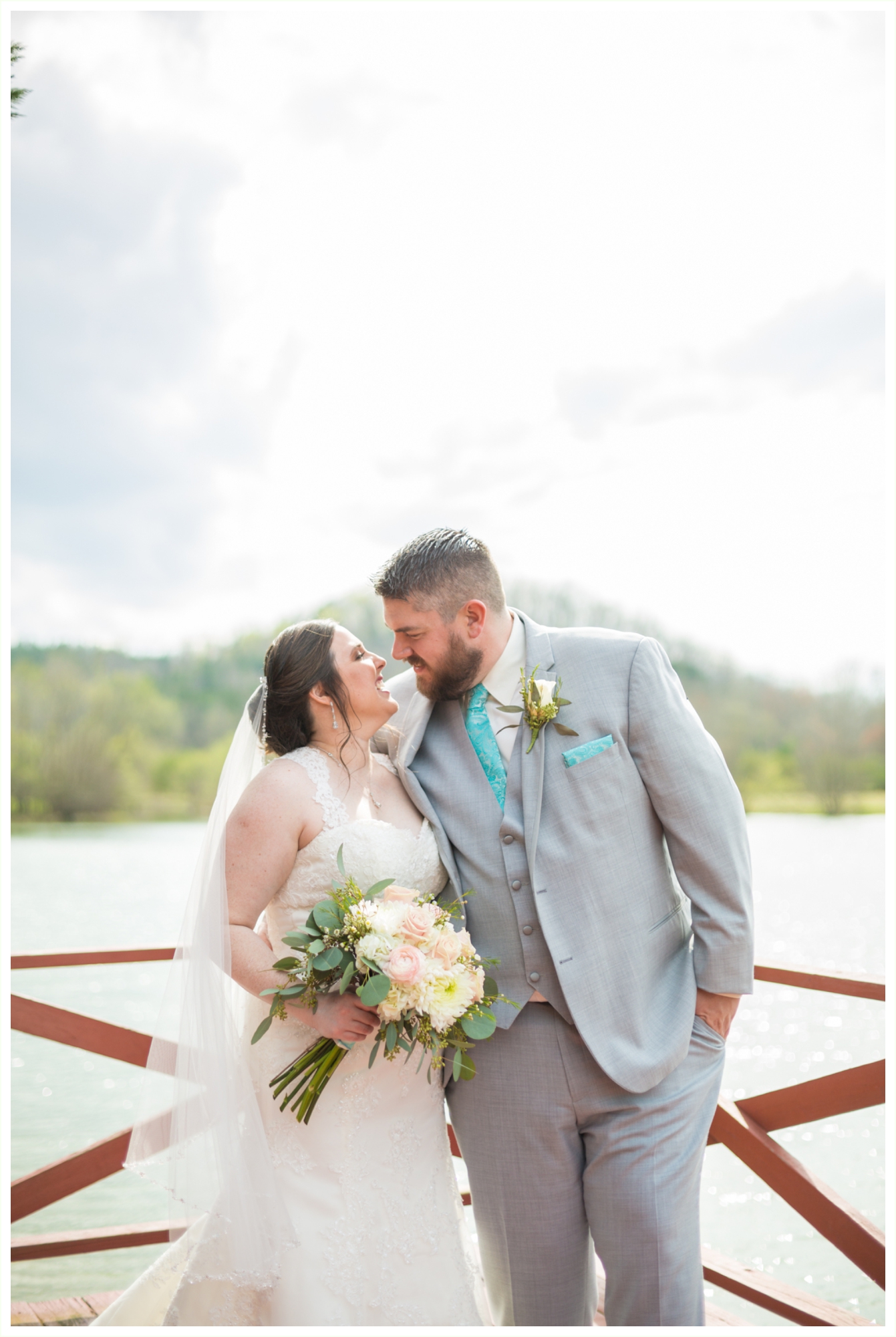 beautiful bride and groom lake portraits at spring lake events wedding in Georgia