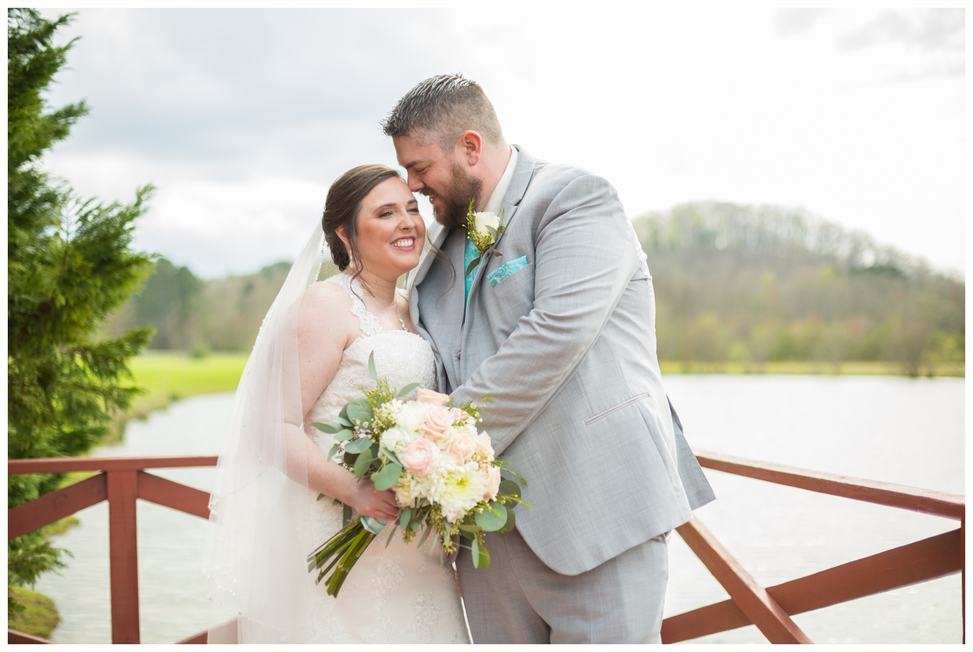 beautiful bride and groom portraits at spring lake events wedding in Georgia on the lake dock