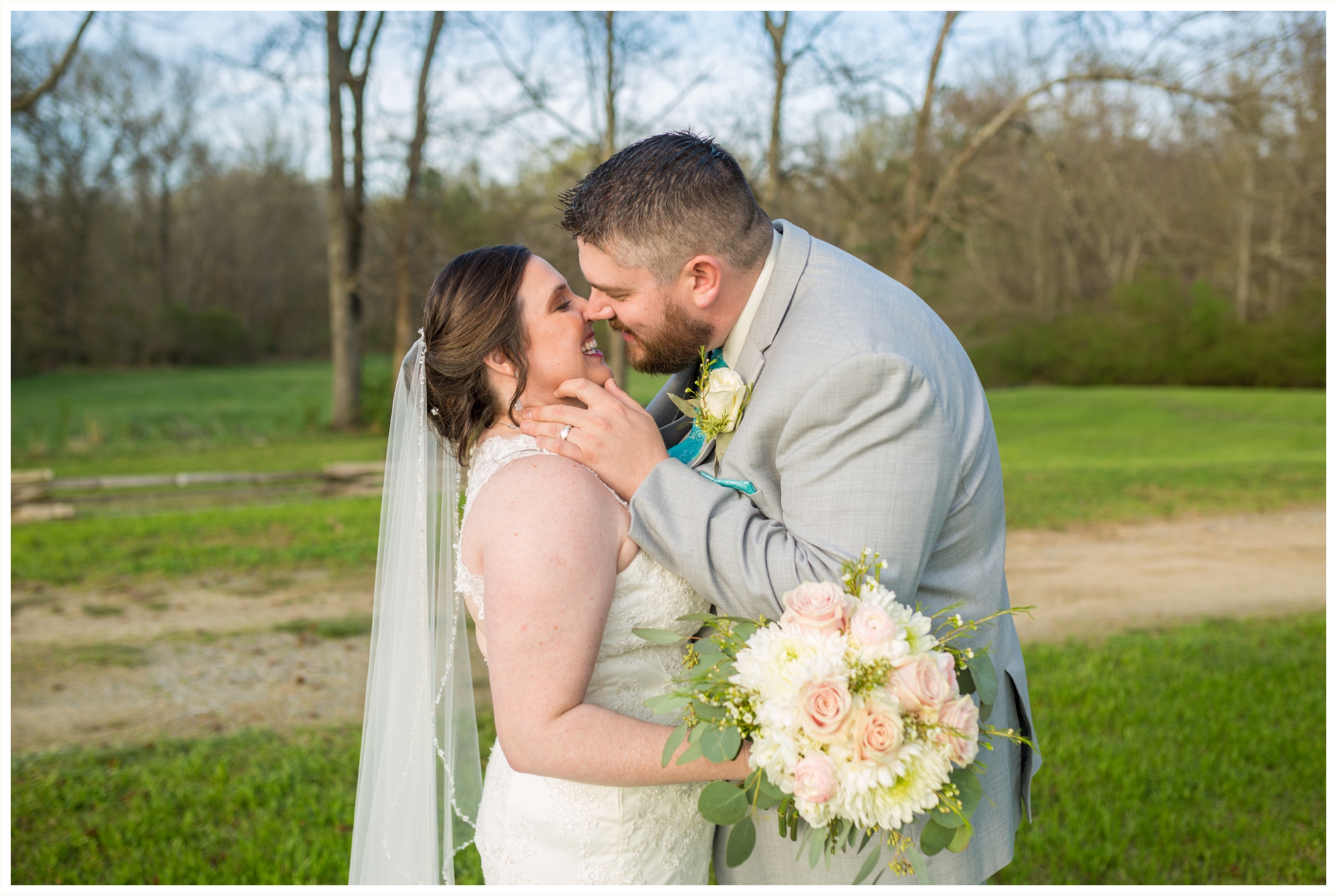 beautiful bride and groom portraits at spring lake events wedding in Georgia candid snuggly photos