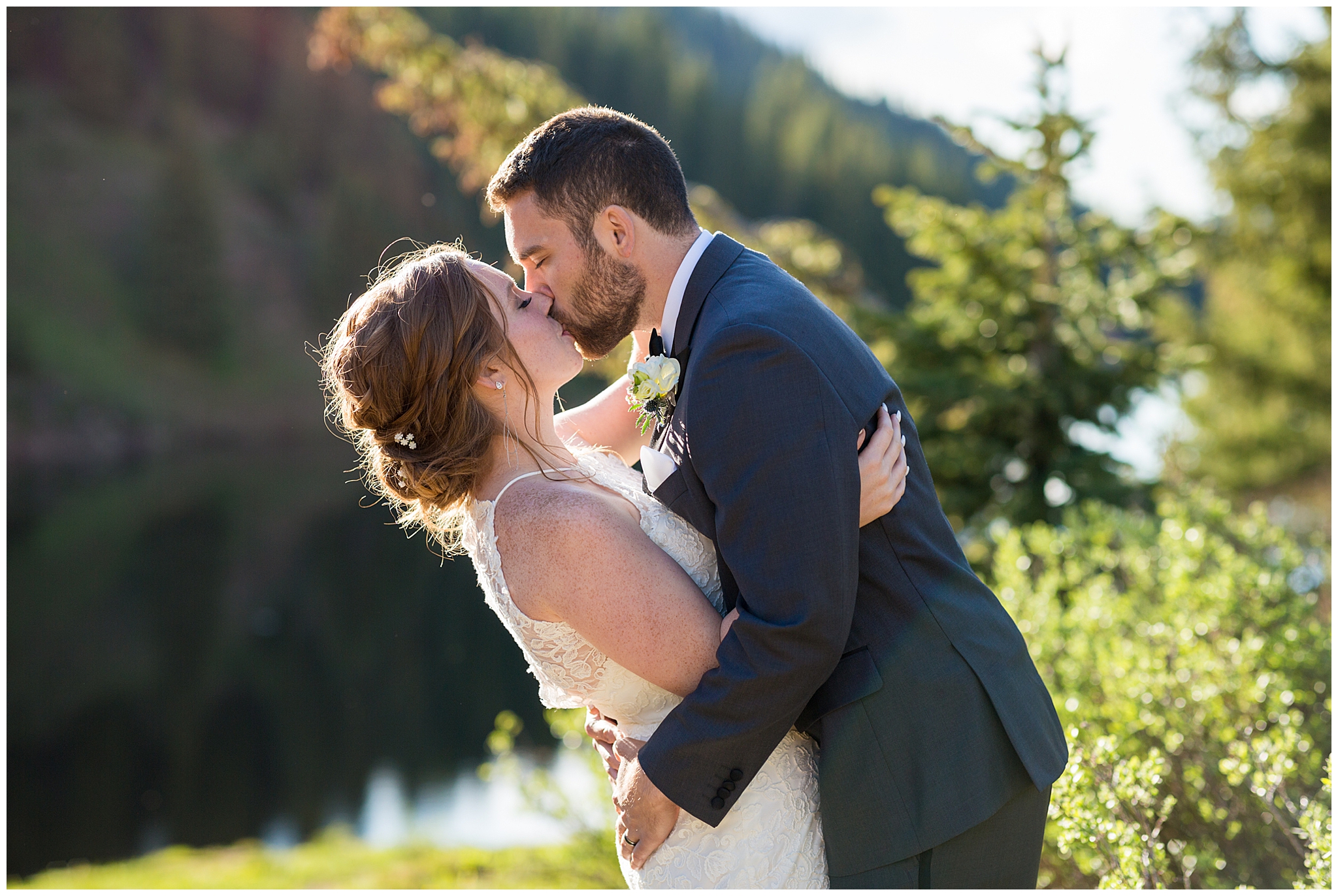 bride and groom portraits kissing outdoor mountain location for elopement wedding vail colorado elopement photographer
